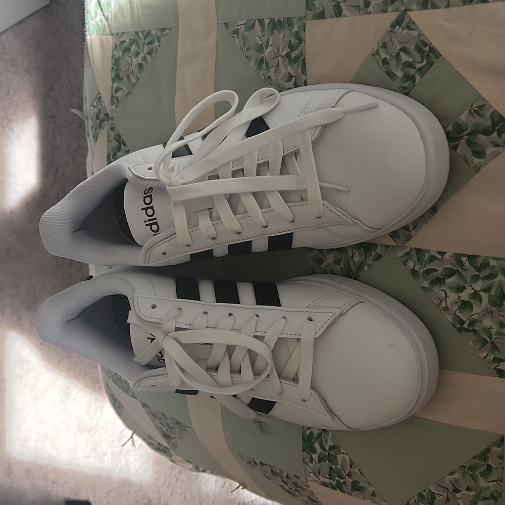 Tried on once at the store brand new adidas shoes
